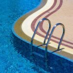What Really Keeps Commercial Pools Clean, According to a Commercial Pool Service
